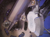 RevTech Rear Brake 4 Piston Caliper & Bracket Polished Harley Shovelhead 1973-80